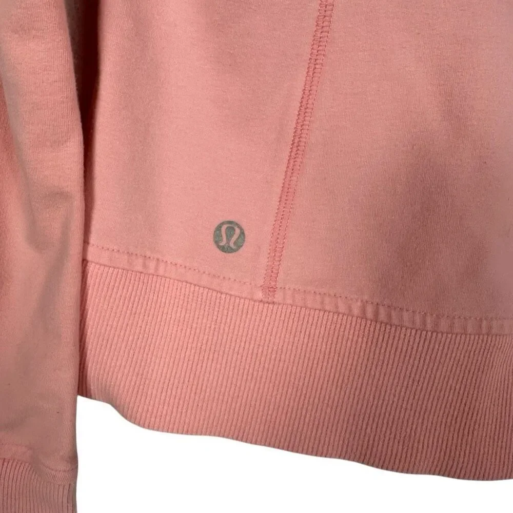 Lululemon Rejuvenate Hoodie size 8 Bleached Coral has a spot